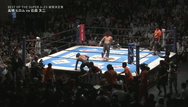 Sunset+Flip+Powerbomb+in+a+Opponent+on+the+Apron+to+the+Floor+2.gif